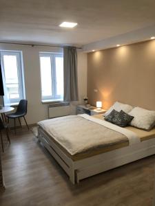 Postel nebo postele na pokoji v ubytování Apartmán U Zlaté hroudy