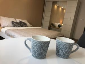 Postel nebo postele na pokoji v ubytování Apartmán U Zlaté hroudy