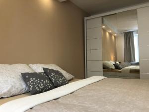 Postel nebo postele na pokoji v ubytování Apartmán U Zlaté hroudy