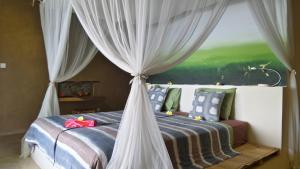 Postel nebo postele na pokoji v ubytování Balila Beach Resort