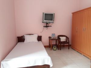 Giường trong phòng chung tại Khách sạn Hưng Vân - Bắc Kạn city