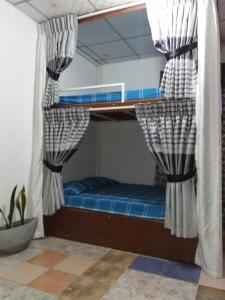 Letto o letti in una camera di Kingfisher Hostel