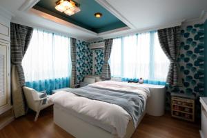 Letto o letti in una camera di Hotel Sunset (Adult Only)