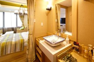 Letto o letti in una camera di Hotel Sunset (Adult Only)