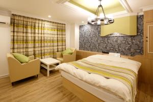 Letto o letti in una camera di Hotel Sunset (Adult Only)