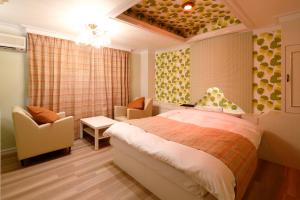 Letto o letti in una camera di Hotel Sunset (Adult Only)