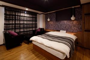 Letto o letti in una camera di Hotel Sunset (Adult Only)