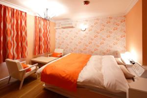 Letto o letti in una camera di Hotel Sunset (Adult Only)