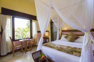 Katil atau katil-katil dalam bilik di Ubud Aura Retreat