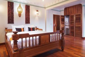 Postel nebo postele na pokoji v ubytování Hello Cambodia Boutique