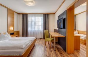 TV a/nebo společenská místnost v ubytování Sporthotel Kurz