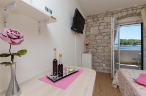 TV a/nebo společenská místnost v ubytování Apartments Djurdjica