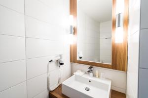 Ванна кімната в City Hotel Biel Bienne Free Parking