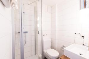 Ванна кімната в City Hotel Biel Bienne Free Parking