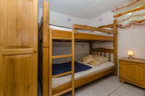Posteľ alebo postele v izbe v ubytovaní Apartments Ljubica + 37 fotografií