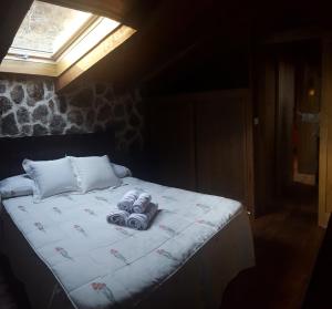 Postel nebo postele na pokoji v ubytování Casa Rural Refugio Los Perdigones
