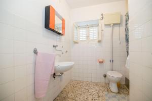Koupelna v ubytování Apartments Petar