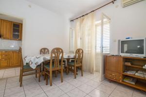 Kuchyň nebo kuchyňský kout v ubytování Apartments Petar
