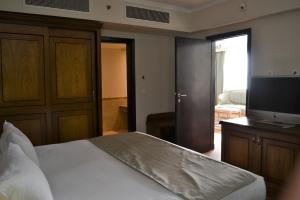 Voodi või voodid majutusasutuse Cleopatra Hotel toas