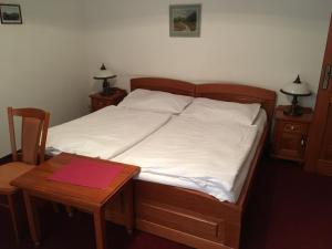 Posteľ alebo postele v izbe v ubytovaní Hotel Pegas Brno