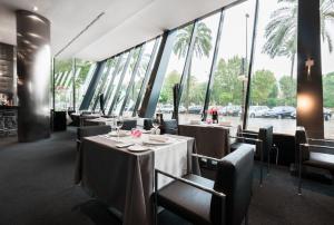 Reštaurácia alebo iné gastronomické zariadenie v ubytovaní Eurostars Palace
