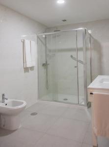 Ein Badezimmer in der Unterkunft Troia Hotel