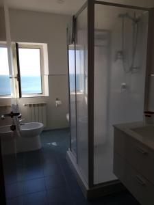 Vannituba majutusasutuses Hotel L'Isola
