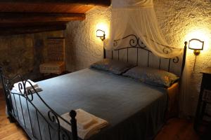 Posteľ alebo postele v izbe v ubytovaní Locanda Angelica