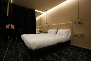 Postel nebo postele na pokoji v ubytování X Dream Hotel-Adults Only