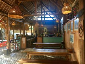 Majoituspaikan Villa Monyet Java ravintola tai vastaava paikka