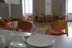 Um restaurante ou outro lugar para comer em OBENauf in Unternalb