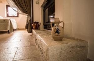Posedenie v ubytovaní I Trulli Di Nonno Giovanni