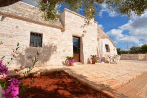 Vonkajšia záhrada v ubytovaní I Trulli Di Nonno Giovanni