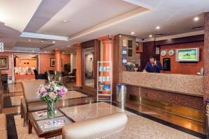 a lobby of a hotel with a reception desk at Hotel 2000 Kavaklıdere in Ankara