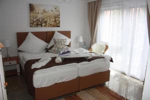 Un pat sau paturi într-o cameră la Hotel Vesa