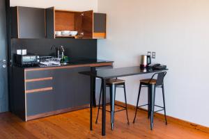 Kuchyň nebo kuchyňský kout v ubytování Augusta Hotel