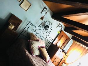 Postel nebo postele na pokoji v ubytování Suite Attico con Altana