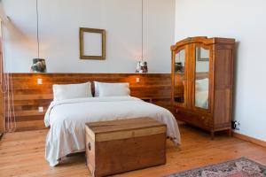 Postel nebo postele na pokoji v ubytování Augusta Hotel