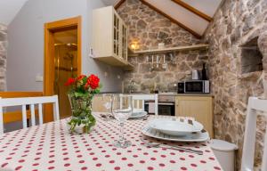 Kuchyň nebo kuchyňský kout v ubytování House Gordana