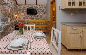 Kuchyň nebo kuchyňský kout v ubytování House Gordana