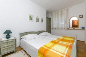 Postel nebo postele na pokoji v ubytování House Jadranka