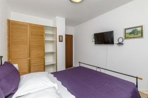 Postel nebo postele na pokoji v ubytování House Jadranka