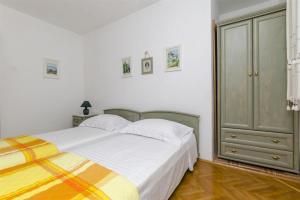 Postel nebo postele na pokoji v ubytování House Jadranka