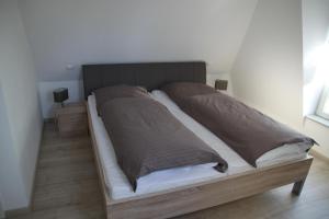 Postel nebo postele na pokoji v ubytování Ferienwohnung am Elbdeich