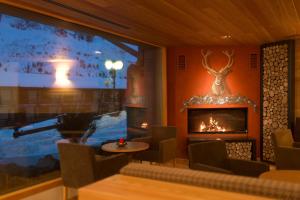 Posezení v ubytování Hotel Delle Alpi