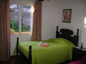 Un pat sau paturi într-o cameră la Residencia ANA