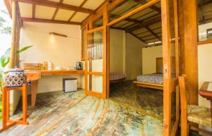 Η κουζίνα ή μικρή κουζίνα στο Galería Suites San Pancho +44 φωτογραφίες