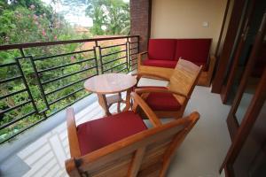 A balcony or terrace at Villa Ubud Sunshine