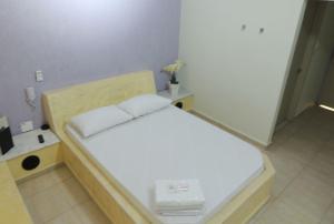 Katil atau katil-katil dalam bilik di Motel Kokeluxe