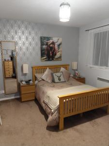 A bed or beds in a room at An-Sealgair Bed & Breakfast 